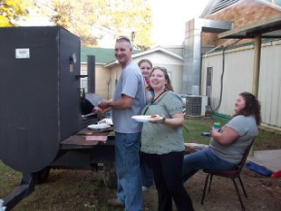 Dustin grills while Stacey, Kaleigh and Donna watch
