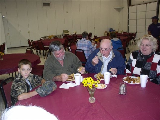 Hunter, Garland, Bob and Martha enjoy the meal