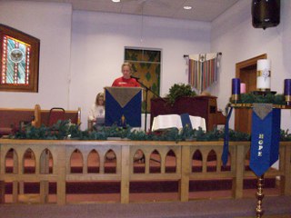 Victoria gives the blessing of the Advent wreath