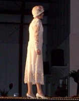 White flapper dress with cloche hat